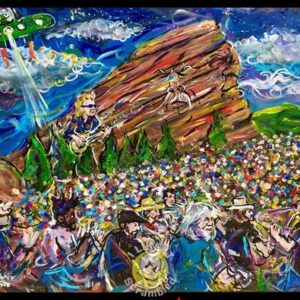 Colorful outdoor concert with red rock and UFO